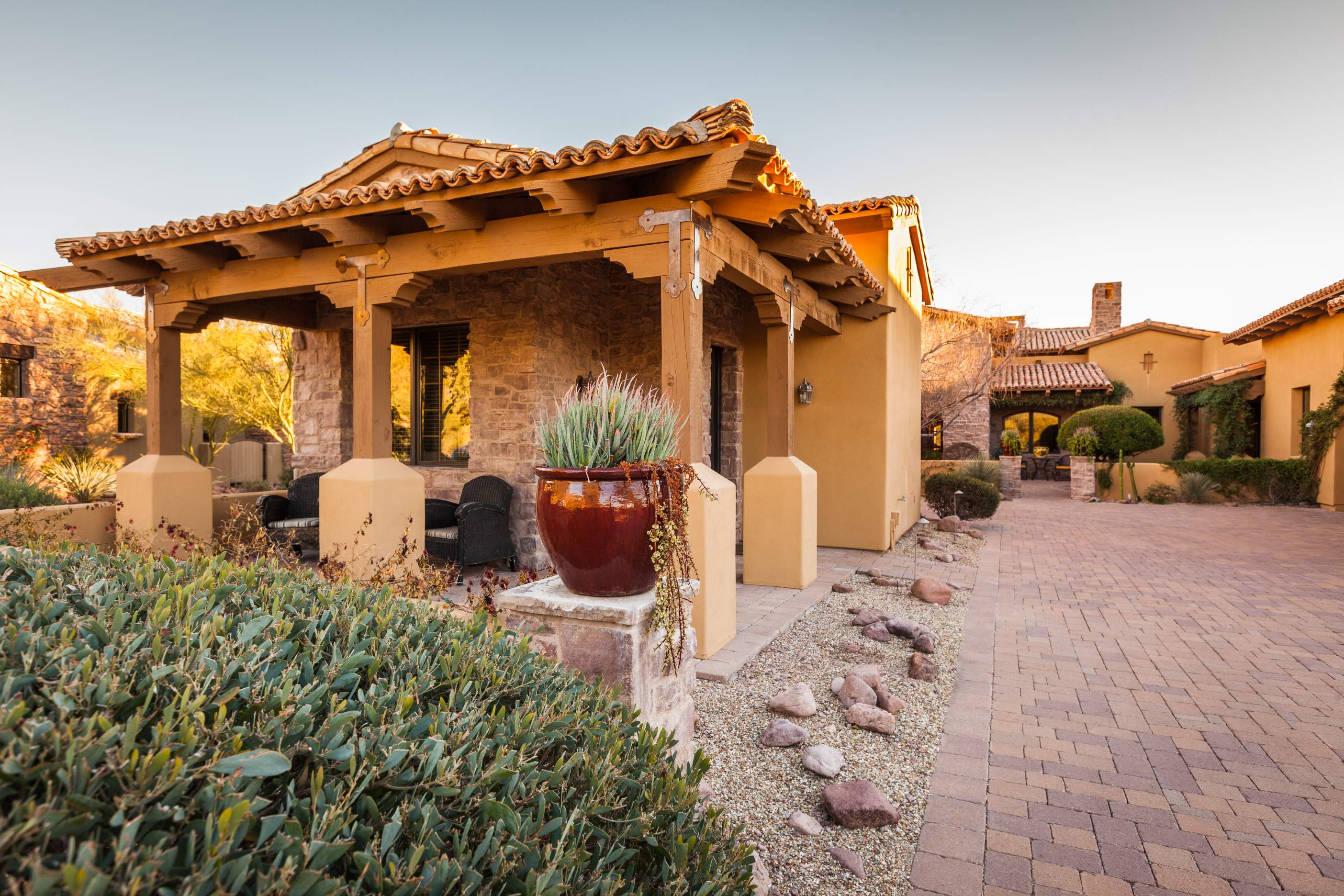 Mediterranean-style house with tiled roof.