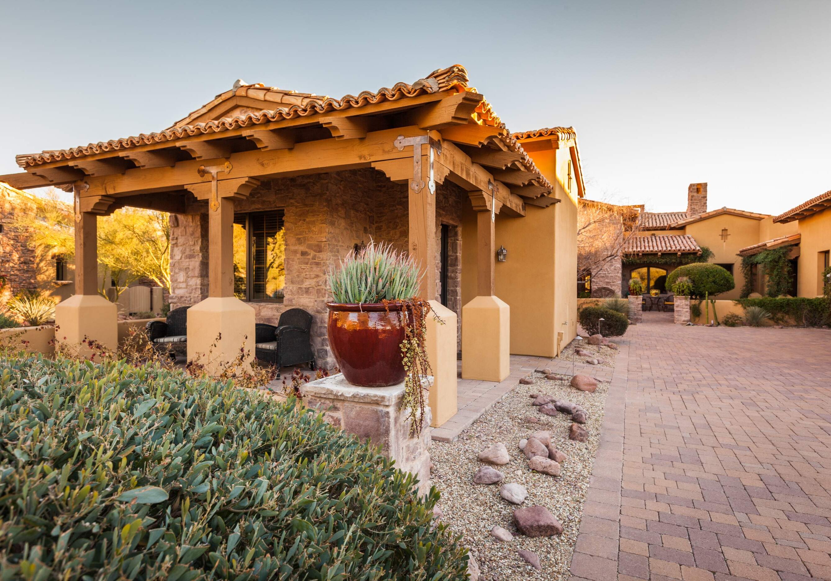 Mediterranean-style house with tiled roof.